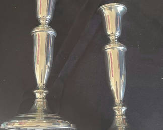 Lot 56: Pair of silver plated candlesticks