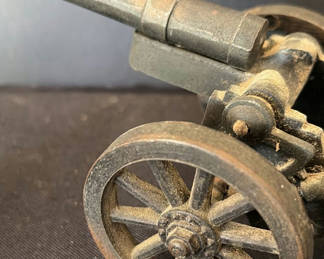 Lot 23: Vintage metal toy cannon with wheeled carriage
