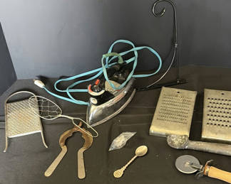 Lot 2: Assorted vintage metal kitchen tools and an electric iron