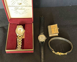 Lot 26: Two vintage wristwatches, a bracelet, and small Bible