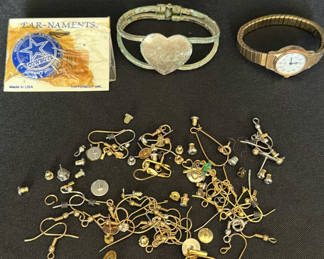 Lot 32: Assorted jewelry including bracelets, watch, and findings