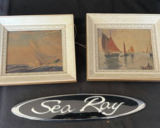 Lot 35: Two Sailboat Paintings with Sea Ray Emblem