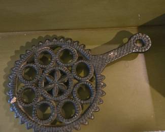 Vintage Cast Iron Trivet with Star and Circles Design