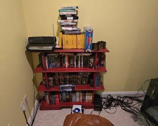 Assorted VHS Tapes, DVDs, and Board Games
