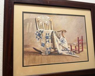print of rocking chair with quilt