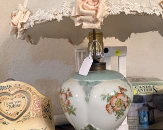 This vintage GWTW-style (Gone With The Wind) table lamp features a white milk glass base with hand-painted Floral Designs and a Brass-Finish Pedestal Base