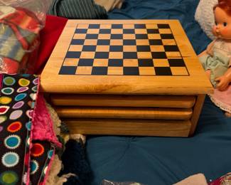 wood checkers and misc game boards with pieces