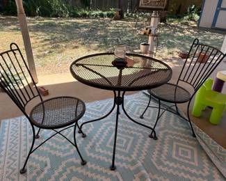 wire bistro set and outdoor carpet