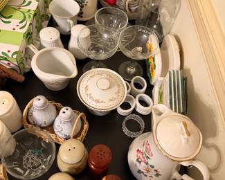 assortment of salt and pepper shakers