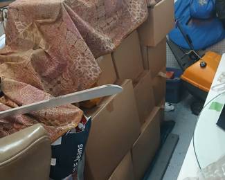 BOXES WILL BE UNPACKED IN THE HOUSE AND GARAGE 