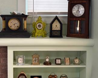 An impressive collection of vintage clocks, including mantel, wall, regulator, anniversary, alarm, and decorative clocks. Featuring mechanical, wind-up, and mid-century styles in wood, brass, marble, and ornate cast metal cases