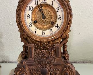 It is a Waterbury Clock Co. movement in a French-inspired case