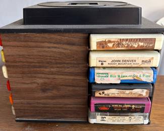 Vintage 8-track tape collection with multiple storage cases, featuring classic country, pop, rock, jazz, easy listening, soul, and soundtrack albums. Includes artists such as Frank Sinatra, Tony Bennett, John Denver, Sonny & Cher, Elton John, Funkadelic, Linda Ronstadt, Mel Tillis, Diana Ross, Tony Orlando & Dawn, and more. Also includes several 8-track carrying/storage cases filled with tapes