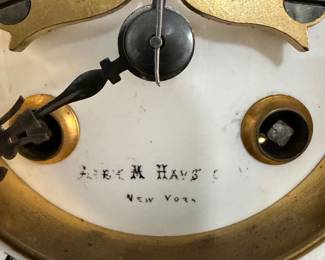 Antique Victorian Black Mantel Clock retailed by A. M. Hays, New York, circa 1875–1890. Features an original painted Roman numeral dial with visible escapement, gilt bezel, and spring-driven time and strike movement