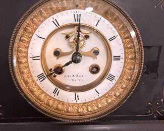Antique Victorian Black Mantel Clock retailed by A. M. Hays, New York, circa 1875–1890. Features an original painted Roman numeral dial with visible escapement, gilt bezel, and spring-driven time and strike movement