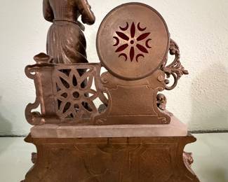 Antique French Figural Mantel Clock featuring a young woman reading atop a white marble base with ornate bronze-finished spelter mounts. Houses an 8-day French time and strike movement by Grivolat Frères Aînés. Circa 1880–1900
