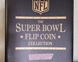Officially licensed NFL Super Bowl Flip Coin Collection produced by The Franklin Mint. Includes commemorative Super Bowl flip coins housed in a deluxe presentation album