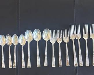 a Sterling Reed and Barton Classic Rose Flatware