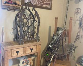 Iron Horseshoe Wine Rack, Rustic Side Tablem Painted Bison Skull, Antique Ladderback Chair, Roping Equipment