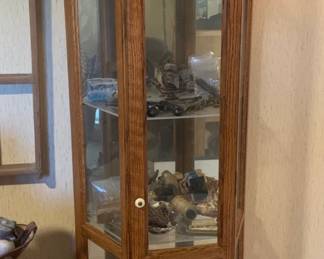 Oak Lighted Curio Cabinet by Buhler $400 (72 x 12 x 25.5)