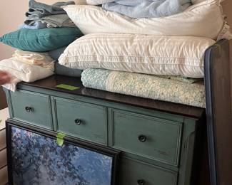 dresser and bedding