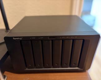 Synology DS1817+ network-attached storage device with six drive bays installed.