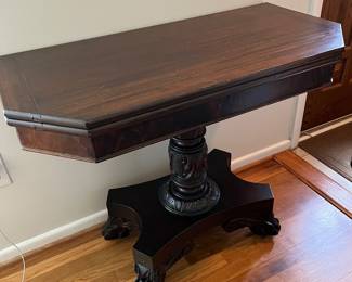 Antique clawfoot game table