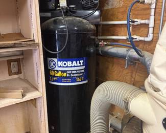 #78 - $375 - Kobalt 60 gallon cast iron stationary air compressor.