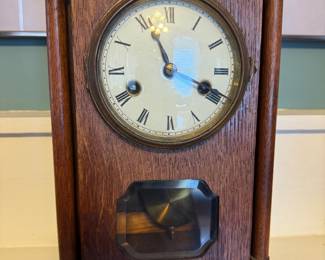 #93- $100 - 1920's German clock oak with columns - winder in office 