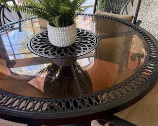 #67 - $450 - Aluminum black round table with lazy susan 50Dx28T with 4 armchairs