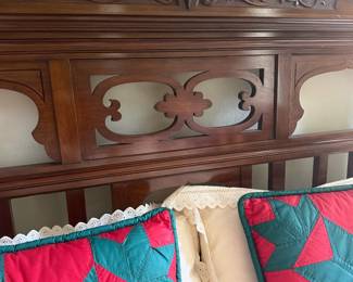 #45 - $700 - Antique carved mahogany bed on casters 57Lx64W with vintage mattress