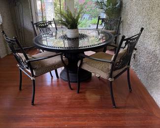#67 - $450 - Aluminum black round table with lazy susan 50Dx28T with 4 armchairs