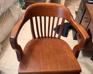#63 - $100-Antique oak swivel armchair