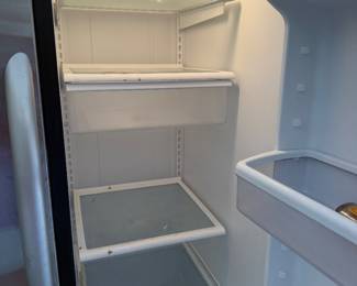 #87 - $400 -Refrigerator in garage