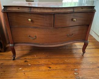 French Regency Louis XVI walnut bow front chest