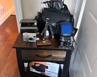 cameras, small side table