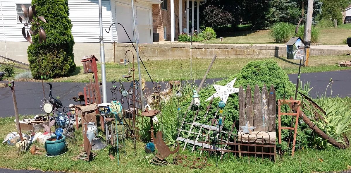 outdoor wall art, shepherd’s hooks, bird houses, bird feeders, metal statuary, wood statuary