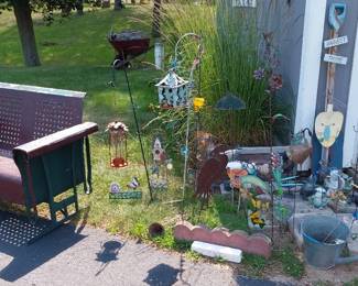 patio glider rocker, shepherd’s hooks, bird houses, bird feeders, metal statuary, wood statuary, trellis, wind chimes, frogs, turtles, birds, fish, nautical décor