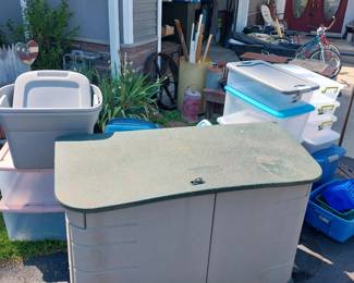 Rubbermaid deck box, storage totes, iron tractor wheel