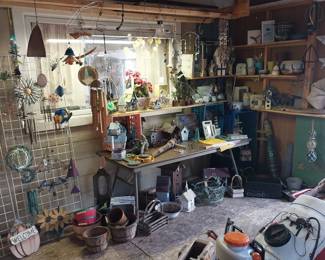 shepherd’s hooks, bird houses, bird feeders, metal statuary, wood statuary, trellis, wind chimes, frogs, turtles, birds, fish, nautical décor