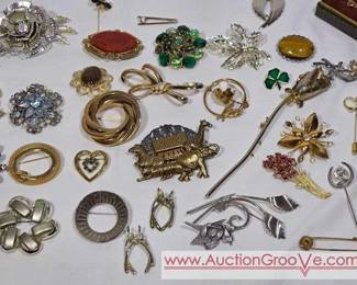 Brooches and Pins.