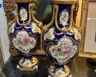 A pair of hand painted French earns