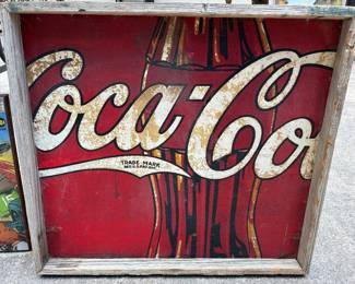 Vintage Coca-Cola sign on metal