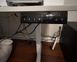 Shaped electric standing desk 