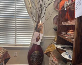 The tall dark red vase!