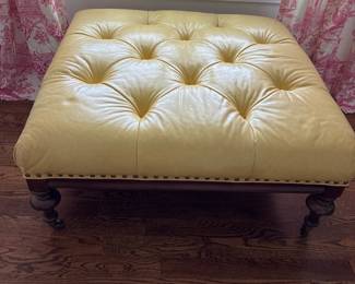 Yellow leather square ottoman with nail heads