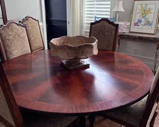 Round table with chairs and pad