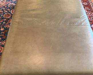 Green leather ottoman