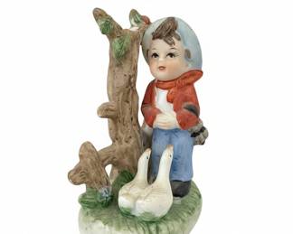 Vintage Porcelain Figurine of a Boy with Two Geese