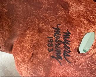 Handmade Leather Mask with Horned Figure and Inscription second image